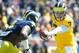 Apr 5, 2014; Ann Arbor, MI, USA; Michigan Wolverines quarterback Shane Morris (7) hands off to running back De'Veon Smith (4) before the Spring Game at Michigan Stadium. Mandatory Credit: Tim Fuller-USA TODAY Sports