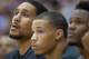 Dwayne Jones, far left, watches the Kings play the Spurs from his seat on the bench.