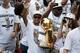 Jun 18, 2014; San Antonio, TX, USA; San Antonio Spurs guard Patrick Mills (8) waves to the fans during the NBA championship parade at San Antonio River Walk. Mandatory Credit: Soobum Im-USA TODAY Sports