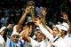 SAN ANTONIO, TX - JUNE 15: The San Antonio Spurs celebrate with the Larry O'Brien trophy after defeating the Miami Heat to win the 2014 NBA Finals at the AT&T Center on June 15, 2014 in San Antonio, Texas. NOTE TO USER: User expressly acknowledges and ag
