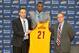 Jun 27, 2014; Independence, OH, USA; Cleveland Cavaliers first round pick Andrew Wiggins (21) is introduced by head coach David Blatt (left) and general manager David Griffin at Cleveland Clinic Courts. Mandatory Credit: David Richard-USA TODAY Sports