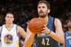 OAKLAND, CA - APRIL 14: Kevin Love #42 of the Minnesota Timberwolves shoots a free throw against the Golden State Warriors on April 14, 2014 at Oracle Arena in Oakland, California. NOTE TO USER: User expressly acknowledges and agrees that, by downloading