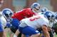 Aug 7, 2013; East Rutherford, NJ, USA; New York Giants quarterback Eli Manning (10) under center during team practice at the Quest Diagnostics Training Center. Mandatory Credit: Brad Penner-USA TODAY Sports