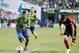Jul 13, 2014; Seattle, WA, USA; Seattle Sounders FC defender DeAndre Yedlin (17) attacks the Portland Timbers defense during the second half at CenturyLink Field. Mandatory Credit: Joe Nicholson-USA TODAY Sports