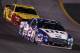 SPARTA, KY - JUNE 28: Brad Keselowski, driver of the #2 Miller Lite Ford, races Joey Logano, driver of the #22 Shell-Pennzoil Ford, during the NASCAR Sprint Cup Series Quaker State 400 presented by Advance Auto Parts at Kentucky Speedway on June 28, 2014