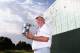 EDMOND, OK - JULY 13: Colin Montgomerie of Scotland poses with the winner's trophy after winning the 2014 U.S. Senior Open Championship in the final round at Oak Tree National on July 13, 2014 in Edmond, Oklahoma. (Photo by Christian Petersen/Getty Imag