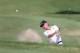 EDMOND, OK - JULY 13: Bernhard Langer of Germany chips from the bunker over the 16th green during the final round of the 2014 U.S. Senior Open Championship at Oak Tree National on July 13, 2014 in Edmond, Oklahoma. (Photo by Christian Petersen/Getty Ima
