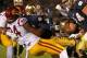 USC DL Leonard Williams tackles Notre Dame's Cam McDaniel during last year's loss to the Fighting Irish. The Irish visit USC Nov. 29.