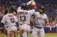 ST. PETERSBURG, FL - MAY 9: Yan Gomes #10 of the Cleveland Indians, Asdrubal Cabrera #13 of the Cleveland Indians and Mike Aviles (R) of the Cleveland Indians celebrate at the plate after all scoring off of Aviles' three-run home run during the seventh in