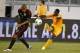 EAST RUTHERFORD, NJ - AUGUST 14: Serge Aurier #17 of Ivory Coast kicks the ball into Carlos Salcido #3 of Mexico during their match at MetLife Stadium on August 14, 2013 in East Rutherford, New Jersey. (Photo by Jeff Zelevansky/Getty Images)