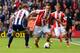 WEST BROMWICH, ENGLAND - MAY 11: Marko Arnautovic of Stoke City evades Craig Dawson of West Bromwich Albion during the Barclays Premier League match between West Bromwich Albion and Stoke City at The Hawthorns on May 11, 2014 in West Bromwich, England.