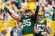 GREEN BAY, WI - NOVEMBER 10: Datone Jones #95 of the Green Bay Packers celebrates a first quarter sack while playing the Philadelphia Eagles at Lambeau Field on November 10, 2013 in Green Bay, Wisconsin. (Photo by Gregory ShamusGetty Images)