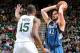 SALT LAKE CITY, UT - JANUARY 2: Kevin Love #42 of the Minnesota Timberwolves looks to pass the ball against Derrick Favors #15 of the Utah Jazz at Energy Solutions Arena on January 2, 2013 in Salt Lake City, Utah. NOTE TO USER: User expressly acknowledges