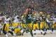 GREEN BAY, WI - DECEMBER 22: John Kuhn #30 of the Green Bay Packers scores a touchdown against the Pittsburgh Steelers at Lambeau Field on December 22, 2013 in Green Bay, Wisconsin. The Steelers defeated the Packers 38-31. (Photo by Jonathan Daniel/Getty