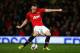 MANCHESTER, ENGLAND - JANUARY 22: Phil Jones of Manchester United misses with his penalty attempt during the Capital One Cup semi final, second leg match between Manchester United and Sunderland at Old Trafford on January 22, 2014 in Manchester, England.