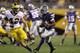 TEMPE, AZ - DECEMBER 28: Wide receiver Tyler Lockett #16 of the Kansas State Wildcats runs with the football after a reception against the Michigan Wolverines during the Buffalo Wild Wings Bowl at Sun Devil Stadium on December 28, 2013 in Tempe, Arizona.