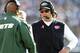 EAST RUTHERFORD, NJ - OCTOBER 13: Head coach Rex Ryan, right, of the New York Jets talks with defensive coordinator Dennis Thurman in the third quarter during a game against the Pittsburgh Steelers at MetLife Stadium on October 13, 2013 in East Rutherford