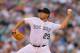 DENVER, CO - JULY 23: Starting pitcher Jorge De La Rosa #29 of the Colorado Rockies delivers to home plate during the seventh inning against the Washington Nationals at Coors Field on July 23, 2014 in Denver, Colorado. The Rockies defeated the Nationals 6