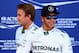 MONTMELO, SPAIN - MAY 10: Lewis Hamilton of Great Britain and Mercedes GP celebrates with team-mate Nico Rosberg of Germany and Mercedes GP after qualifying in pole position ahead of the Spanish F1 Grand Prix at Circuit de Catalunya on May 10, 2014 in Mo