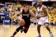 INDIANAPOLIS, IN - MAY 28: Michael Beasley #8 of the Miami Heat drives to the basket against David West #21 of the Indiana Pacers during Game Five of the Eastern Conference Finals of the 2014 NBA Playoffs at Bankers Life Fieldhouse on May 28, 2014 in Ind