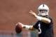 Jun 10, 2014; Tempe, AZ, USA; Arizona Cardinals quarterback Carson Palmer throws during mini camp at the teams Tempe training facility. Mandatory Credit: Mark J. Rebilas-USA TODAY Sports