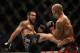 July 26, 2014; San Jose, CA, USA; Robbie Lawler (red gloves) defends against Matt Brown (blue gloves) during the welterweight bout of the FOX UFC Saturday at SAP Center. Mandatory Credit: Kyle Terada-USA TODAY Sports