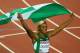 GLASGOW, SCOTLAND - JULY 28: Blessing Okagbare of Nigeria celebrates winning gold in the Women's 100 metres final at Hampden Park during day five of the Glasgow 2014 Commonwealth Games on July 28, 2014 in Glasgow, United Kingdom. (Photo by Robert Cianfl