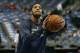 Mar 9, 2014; Dallas, TX, USA; Indiana Pacers guard Evan Turner (12) shoots prior to the game against the Dallas Mavericks at American Airlines Center. Mandatory Credit: Matthew Emmons-USA TODAY Sports