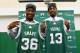 WALTHAM, MA - JUNE 30: Marcus Smart and James Young are introduced as Boston Celtics during a press conference on June 30, 2014 at the Boston Celtics Training Center in Waltham, Massachusetts . NOTE TO USER: User expressly acknowledges and agrees that, b