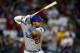 PHOENIX, AZ - MAY 17: Matt Kemp #27 of the Los Angeles Dodgers bats against the Arizona Diamondbacks during the MLB game at Chase Field on May 17, 2014 in Phoenix, Arizona. The Diamondbacks defeated the Dodgers 18-7.(Photo by Christian Petersen/Getty I