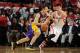 HOUSTON, TX - JANUARY 8: Steve Nash #10 of the Los Angeles Lakers drives against Jeremy Lin #7 of the Houston Rockets on January 8, 2013 at the Toyota Center in Houston, Texas. NOTE TO USER: User expressly acknowledges and agrees that, by downloading and/