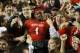 Oct 12, 2013; College Park, MD, USA; Maryland Terrapins wide receiver Stefon Diggs (1) celebrates with students in the stands immediately following the teams 27-26 win over the Virginia Cavaliers at Byrd Stadium. Mandatory Credit: Mitch Stringer-USA TODAY