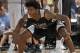 ORLANDO, FL - JULY 8: Elfrid Payton #4 of the Orlando Magic defends against the Memphis Grizzlies during the game during the Samsung NBA Summer League 2014 on July 8, 2014 at Amway Center in Orlando, Florida. NOTE TO USER: User expressly acknowledges and