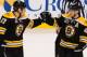 BOSTON, MA - MARCH 4: David Krejci #46 of the Boston Bruins celebrates a hat trick with teammate Milan Lucic #17 against the Florida Panthers at the TD Garden on March 4, 2014 in Boston, Massachusetts. (Photo by Steve Babineau/NHLI via Getty Images)