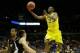 Mar 20, 2014; Milwaukee, WI, USA; Michigan Wolverines guard Caris LeVert (23) lays the ball up during the second round of the 2014 NCAA Tournament against the Wofford Terriers at BMO Harris Bradley Center. Mandatory Credit: Jeff Hanisch-USA TODAY Sports