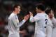 MADRID, SPAIN - NOVEMBER 30: Gareth Bale (L) of Real Madrid CF celebrates with Pepe after scoring Real's 4th goal and his hat-trick during the La Liga match between Real Madrid CF and Real Valladolid CF at Santiago Bernabeu stadium on November 30, 2013 i