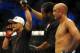 Jul 6, 2014; Las Vegas, NV, USA; Frankie Edgar (red gloves) is named victor over B.J. Penn (blue gloves) following a featherweight bout at Mandalay Bay Events Center. Mandatory Credit: Stephen R. Sylvanie-USA TODAY Sports