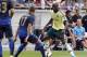 Balotelli in action for Milan during a summer friendly vs. Manchester City