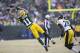 GREEN BAY, WI - DECEMBER 22: Jarrett Boykin #11 of the Green Bay Packers reaches out but misses a pass against the Pittsburgh Steelers at Lambeau Field on December 22, 2013 in Green Bay, Wisconsin. The Steelers defeated the Packers 38-31. (Photo by Wes
