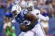 INDIANAPOLIS, IN - SEPTEMBER 08: Dwayne Allen #83 of the Indianapolis Colts runs for a touchdown while defended by Kevin Burnett #94 of the Oakland Raiders during the Colts 21-17 win at Lucas Oil Stadium on September 8, 2013 in Indianapolis, Indiana. (P