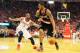 HOUSTON, TX - APRIL 23: LaMarcus Aldridge #12 of the Portland Trail Blazers drives with the ball against Terrence Jones #6 of the Houston Rockets during the second half in Game Two of the Western Conference Quarterfinals during the 2014 NBA Playoffs at