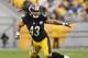 Nov 10, 2013; Pittsburgh, PA, USA; Pittsburgh Steelers strong safety Troy Polamalu (43) reacts to a play during the third quarter of a game against the Buffalo Bills at Heinz Field. Pittsburgh won the game 23-10. Mandatory Credit: Mark Konezny-USA TODAY S