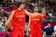 LONDON, ENGLAND - AUGUST 12: Marc Gasol #13 of Spain and Pau Gasol #4 of Spain communicate to their team mates during the Men's Basketball gold medal game between the United States and Spain on Day 16 of the London 2012 Olympics Games at North Greenwich