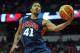 Aug 1, 2014; Las Vegas, NV, USA; USA Team Blue guard Derrick Rose (41) shoots the ball during the USA Basketball Showcase at Thomas & Mack Center. Mandatory Credit: Stephen R. Sylvanie-USA TODAY Sports