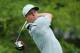 LOUISVILLE, KY - AUGUST 08: Rory McIlroy of Northern Ireland watches his tee shot on the tenth hole during the weather-delayed second round of the 96th PGA Championship at Valhalla Golf Club on August 8, 2014 in Louisville, Kentucky. (Photo by Andrew Re