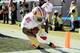 CHARLOTTE, NC - JANUARY 12: Vernon Davis #85 of the San Francisco 49ers catches a touchdown in the second quarter against the Carolina Panthers during the NFC Divisional Playoff Game at Bank of America Stadium on January 12, 2014 in Charlotte, North Caro