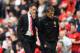 MANCHESTER, ENGLAND - MAY 03: Ryan Giggs the Manchester United interim manager speaks with coach Phil Neville during the Barclays Premier League match between Manchester United and Sunderland at Old Trafford on May 3, 2014 in Manchester, England. (Photo