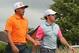 HOYLAKE, ENGLAND - JULY 20: Rory McIlroy of Northern Ireland and Rickie Fowler of the United States walk together during the final round of The 143rd Open Championship at Royal Liverpool on July 20, 2014 in Hoylake, England. (Photo by Mike Ehrmann/Getty