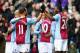 BIRMINGHAM, ENGLAND - MARCH 23: Christian Benteke #20 (R) of Aston Villa celebrates with teammates after scoring the opening goal during the Barclays Premier League match between Aston Villa and Stoke City at Villa Park on March 23, 2014 in Birmingham, E