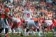 DENVER, CO - DECEMBER 30: Quarterback Brady Quinn #9 of the Kansas City Chiefs audibles at the line of scrimmage during a game against the Denver Broncos at Sports Authority Field at Mile High on December 30, 2012 in Denver, Colorado. The Broncos defeated